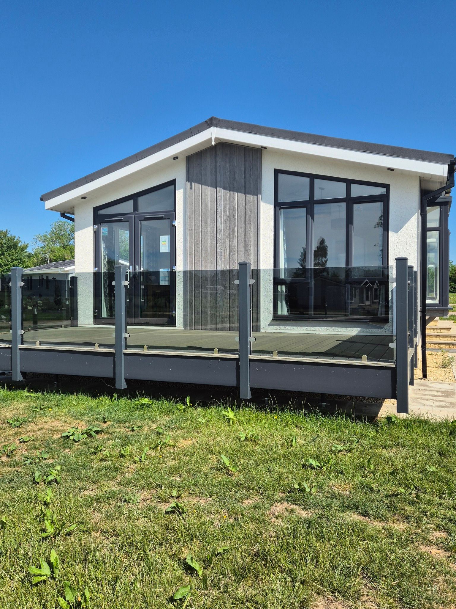 External view of a beautiful Lodge for sale at Cotswold Grange Country Park