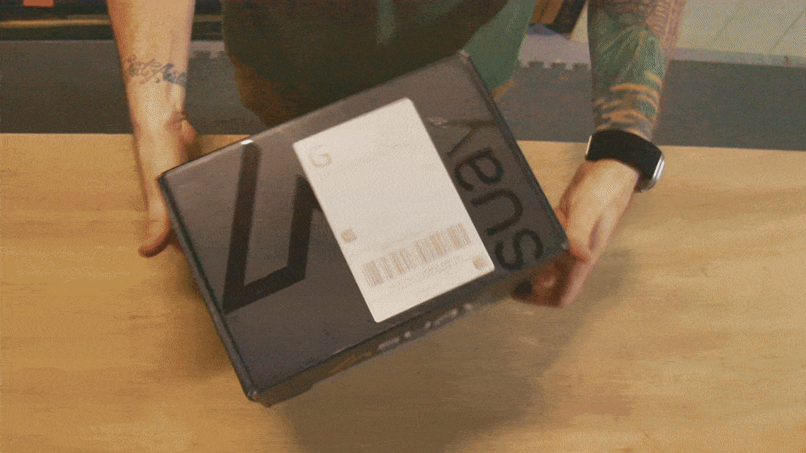 Tiffany & Co. engagement ring in signature blue box with gift bags and ribbon.