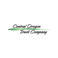Central Oregon Truck Company logo with cursive text and green brushstroke.