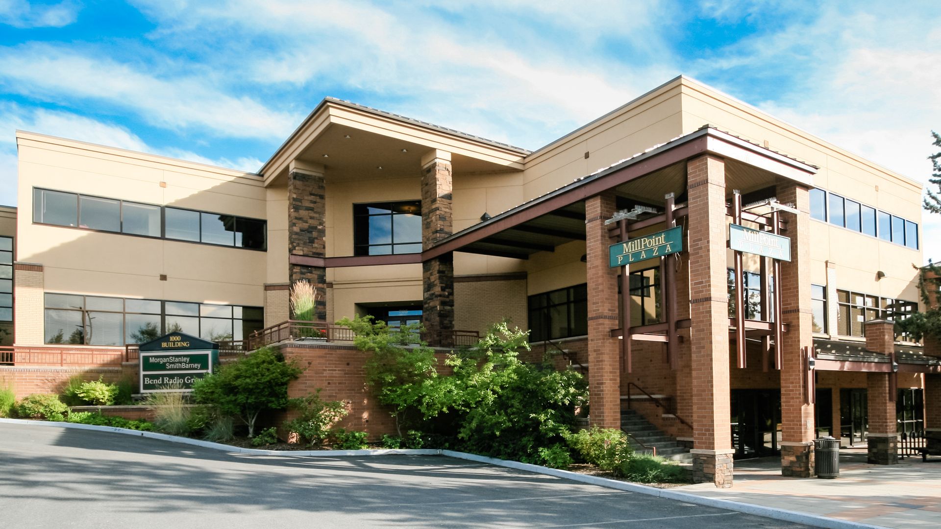 a large building with a large porch and stairs