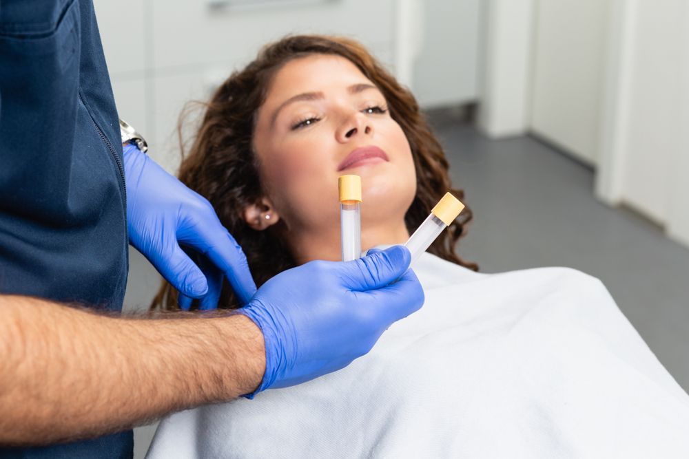 Woman is Getting a Laser Treatment on Her Face — Advanced Cosmetic & Beauty Clinic in Bundaberg South, QLD