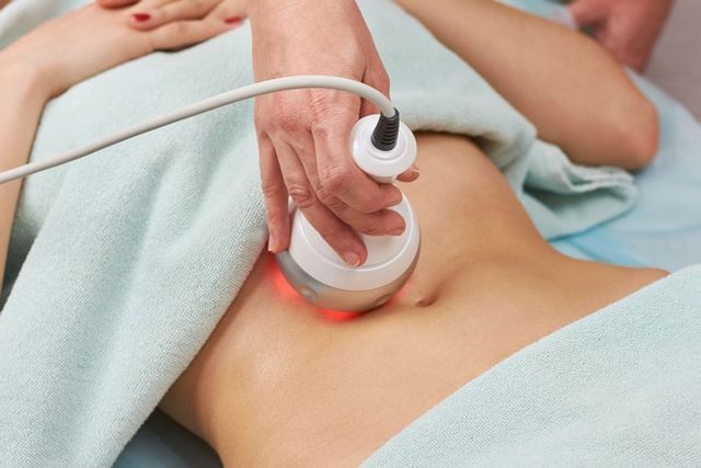 Woman is Getting a Facial Treatment at a Spa — Advanced Cosmetic & Beauty Clinic in Bundaberg South, QLD