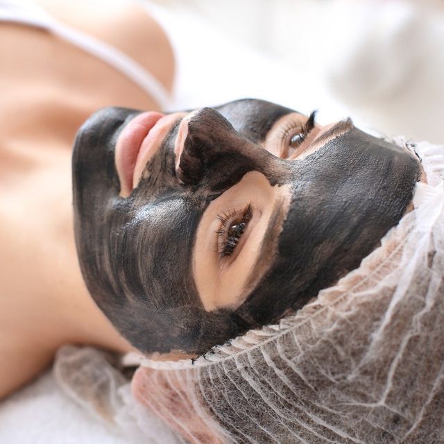 Woman is Wearing a Black Mask on Her Face — Advanced Cosmetic & Beauty Clinic in Bundaberg South, QLD