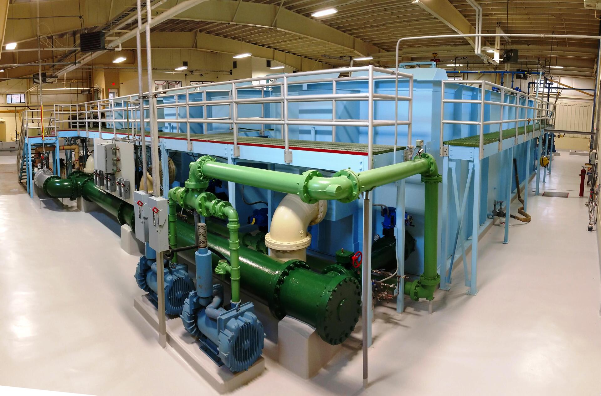 A large building with a lot of pipes and pumps