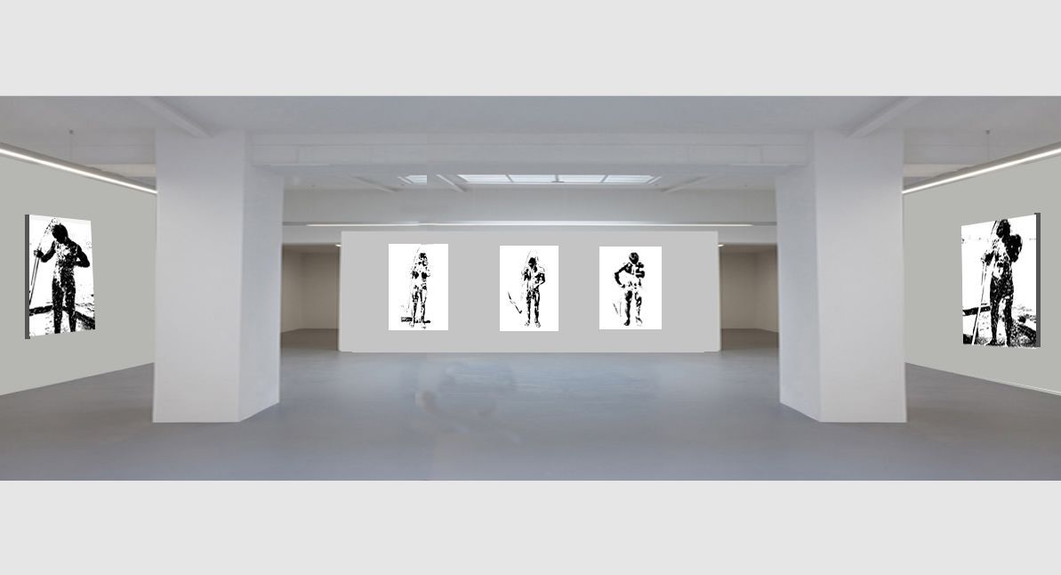White gallery interior with framed black-and-white figures displayed on walls and back wall.