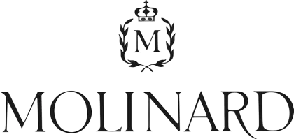 Logo di Molinard con stemma nero decorato e marchio denominativo con grazie su sfondo bianco.