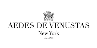 Logo di Aedes de Venustas New York con stemma su sfondo bianco