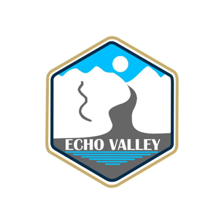 Echo Valley logo with mountain, steaming valley, blue sky, and sun inside a hexagon badge