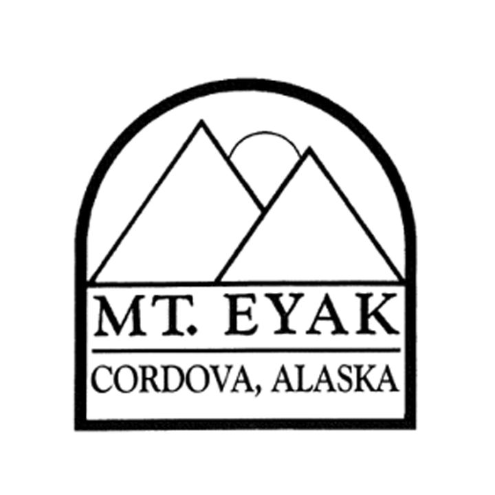 Black-and-white Mt. Eyak Cordova, Alaska logo with mountains and sun inside an arch