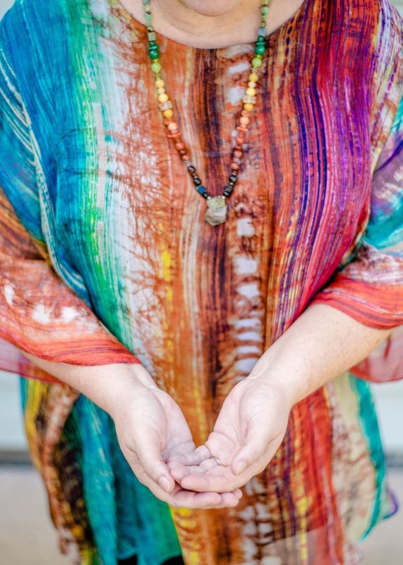 Missy Barnes wearing a beaded necklace, close-up