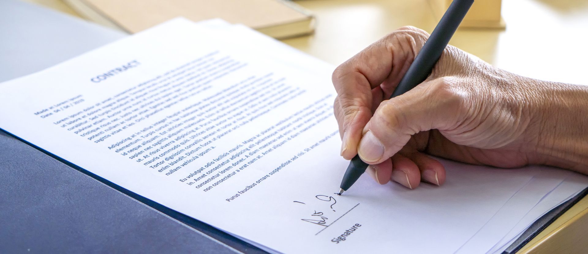 Client Signing the Contract — Bolingbrook, IL — Bolingbrook Promenade Estate Planning LLC
