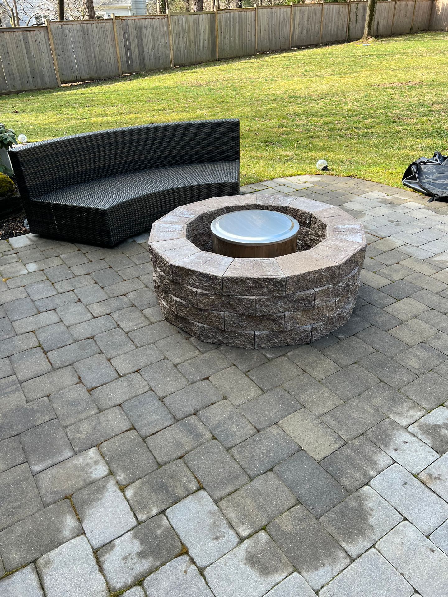Backyard stone fire pit.