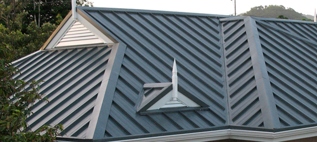Close-up view of seam roof under construction on waterproofing laye