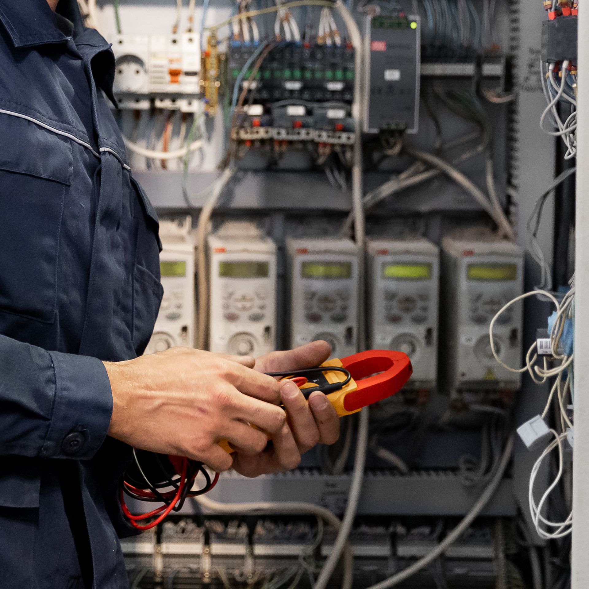 Electrician Checking the Electrical Panel