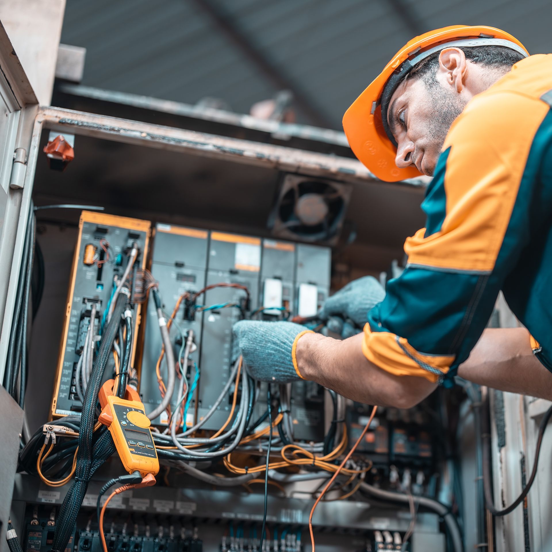 Electrician Working on Electrical Box