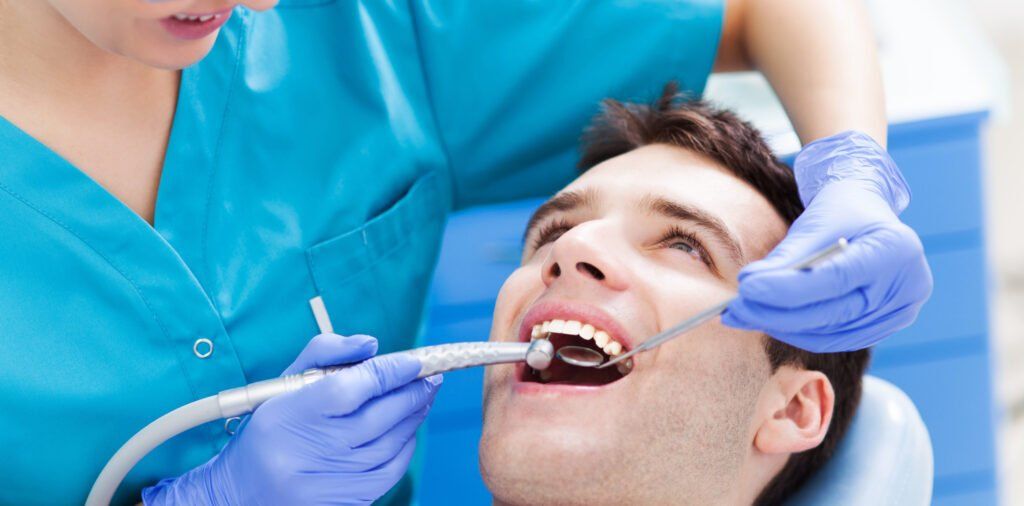 Patient receiving a dental check-up