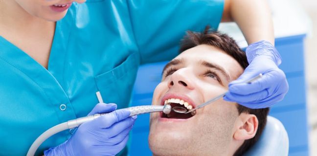 Patient receiving a dental check-up