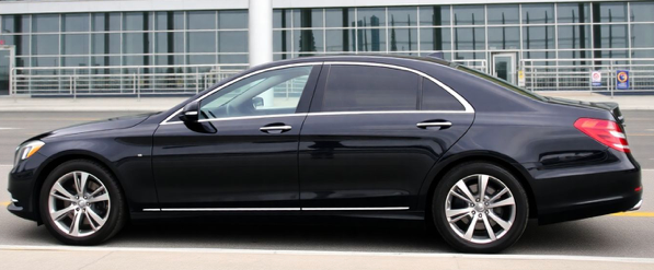 Black car service curbside at Newark Airport