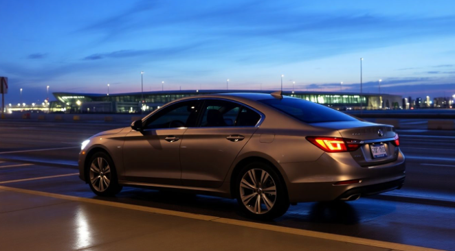 car waiting at Newark Airport terminal at dusk