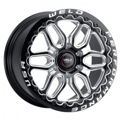 A close up of a weld performance wheel on a white background.