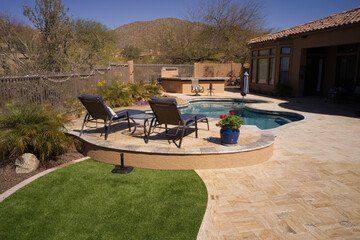 artificial grass installed at a pool side