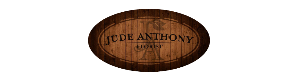 Oval wooden plaque with the text “JOE ANTHONY” and “GUITARS” engraved in the center