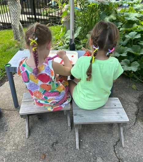 Montessori child working on practical life skills