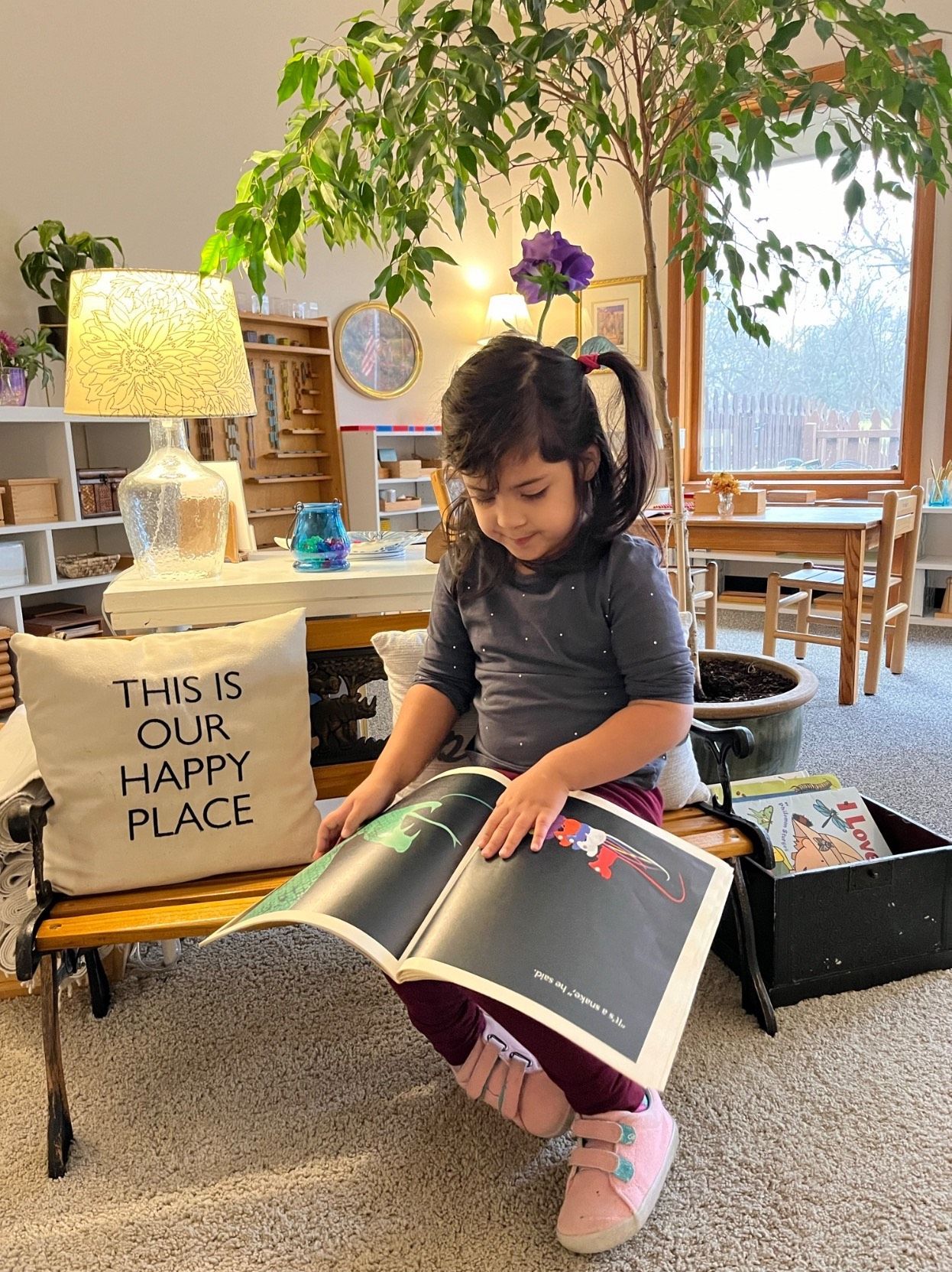 Child working with Montessori math materials