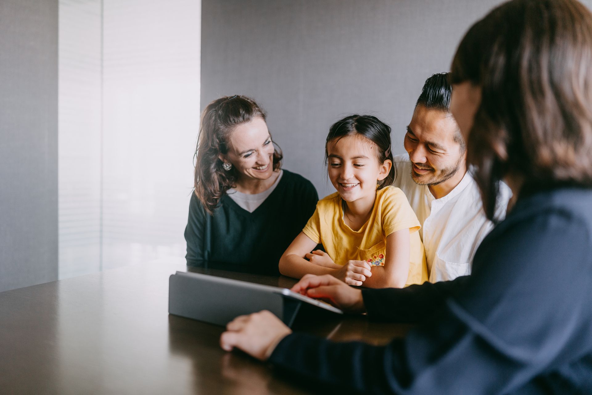 A divorce lawyer from the Law Office of R. Robert Clothier, P.C., with a family at their Colorado Sp