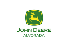 Logotipo da John Deere Alvorada com escudo verde e veado amarelo sobre fundo branco.