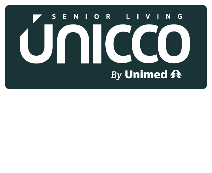 Logotipo da Unico Senior Living em branco sobre fundo verde-azulado escuro, com a inscrição “By Unimed” abaixo.