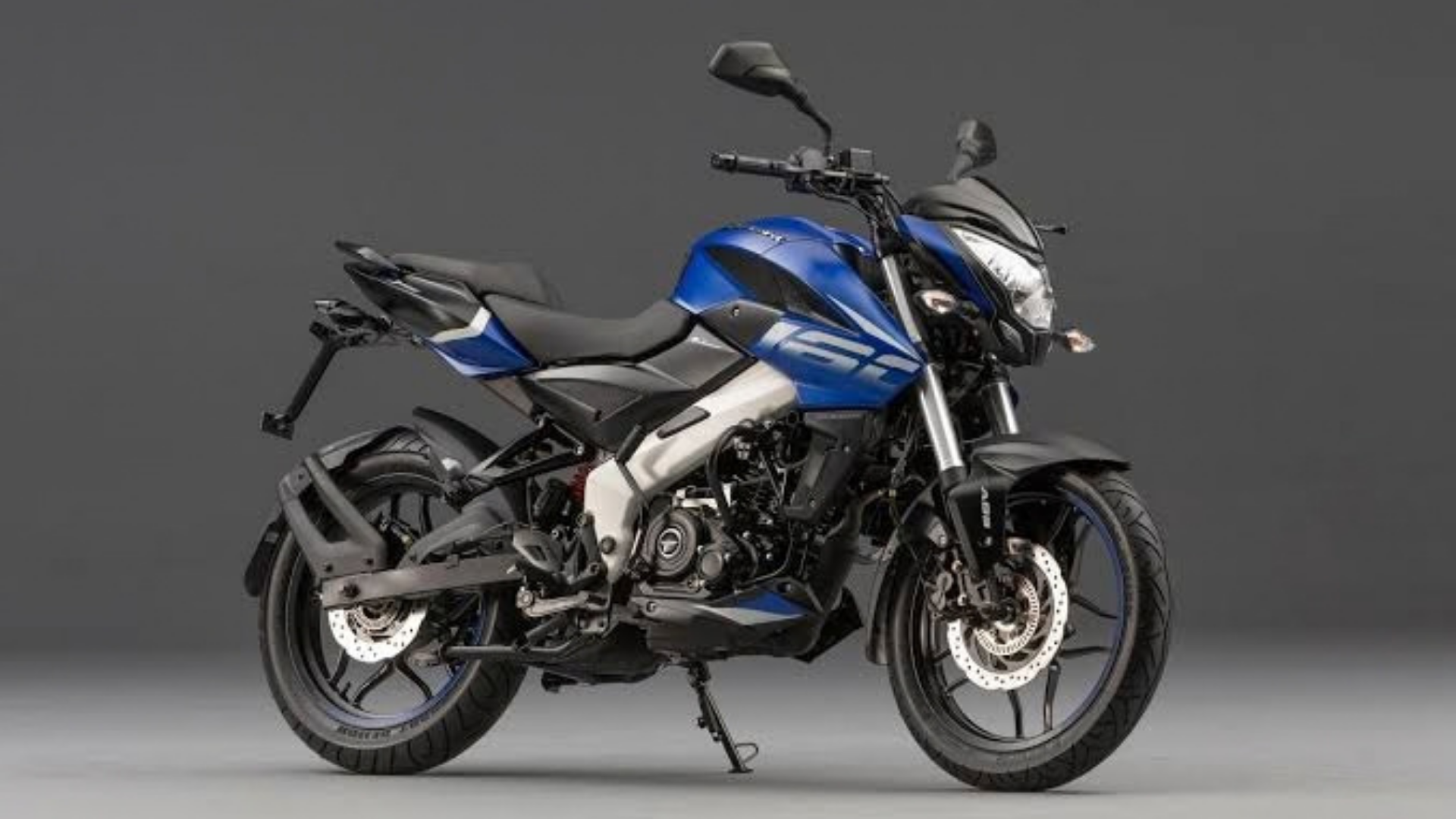 Blue and black sport motorcycle on a gray studio background