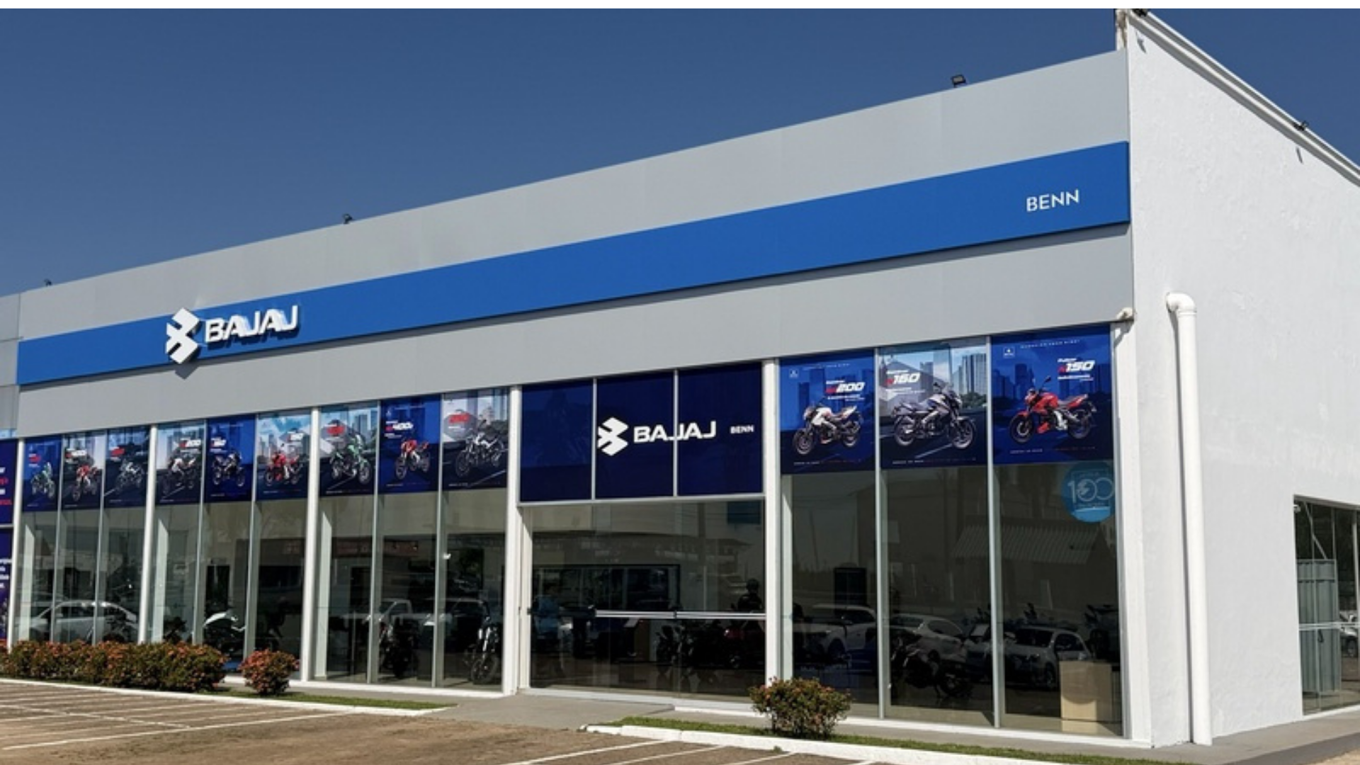 Hyundai dealership exterior with blue-and-white facade and large showroom windows
