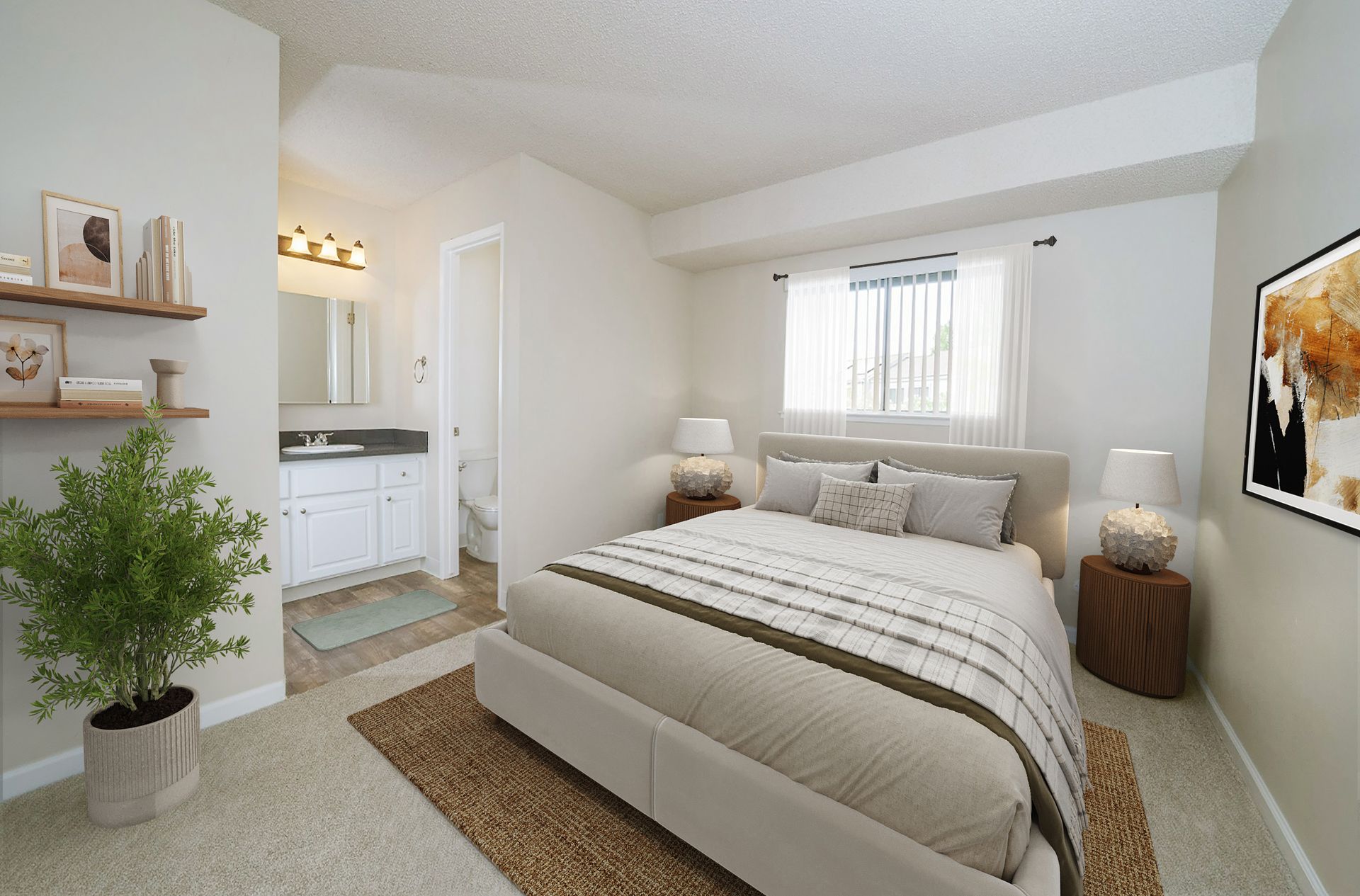 Bedroom with bed, bathroom, plant, rug, and artwork. Neutral color scheme at Valley Ridge Apartments.