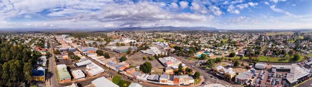 Aerial Panorama of a Town With Buildings, Roads, and Green Spaces — Tempshift Pool Heating in Hunter Valley, NSW