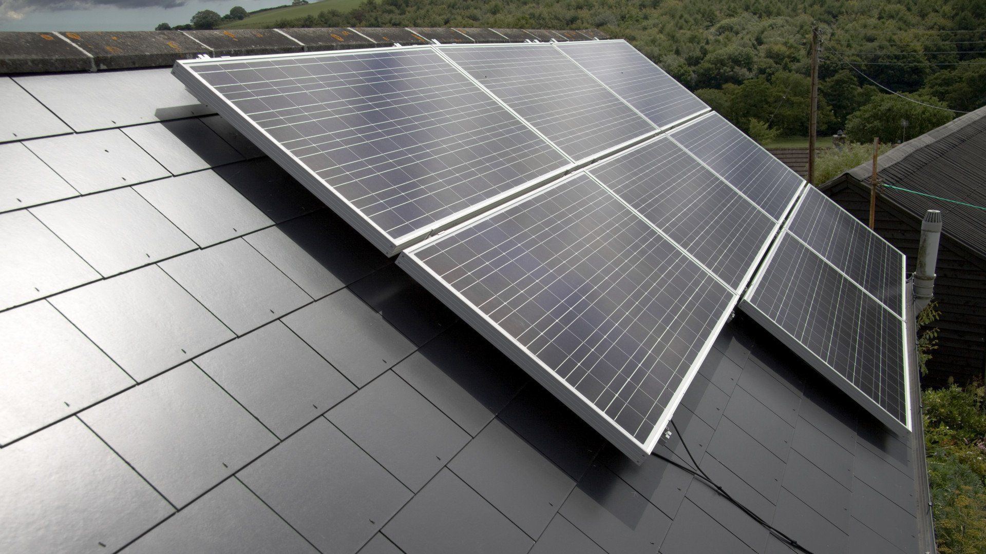 Solar Panels Installed on a Gray Slate Roof — Tempshift Pool Heating in Hunter Valley, NSW