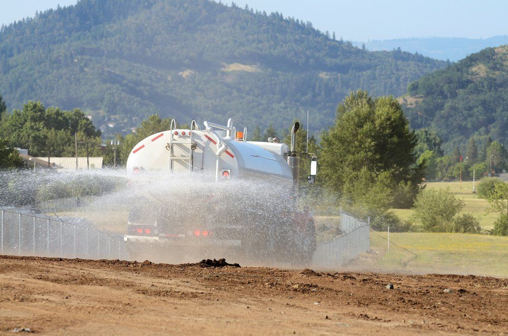Spraying Water on the Hill — Rainman Domestic Water in Avoca, QLD