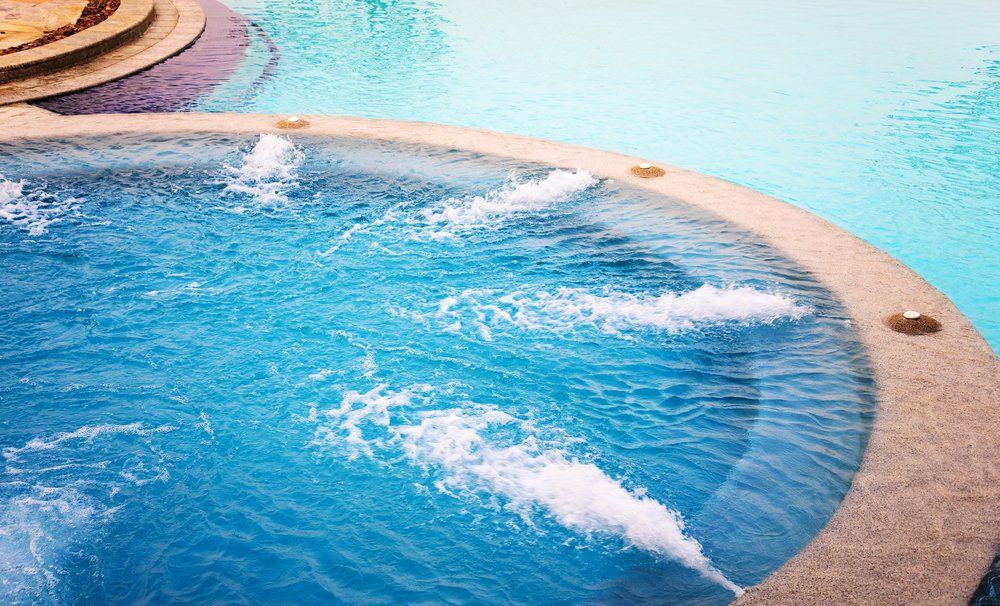 Outdoor Jacuzzi with Fresh Blue Water — Rainman Domestic Water in Avoca, QLD