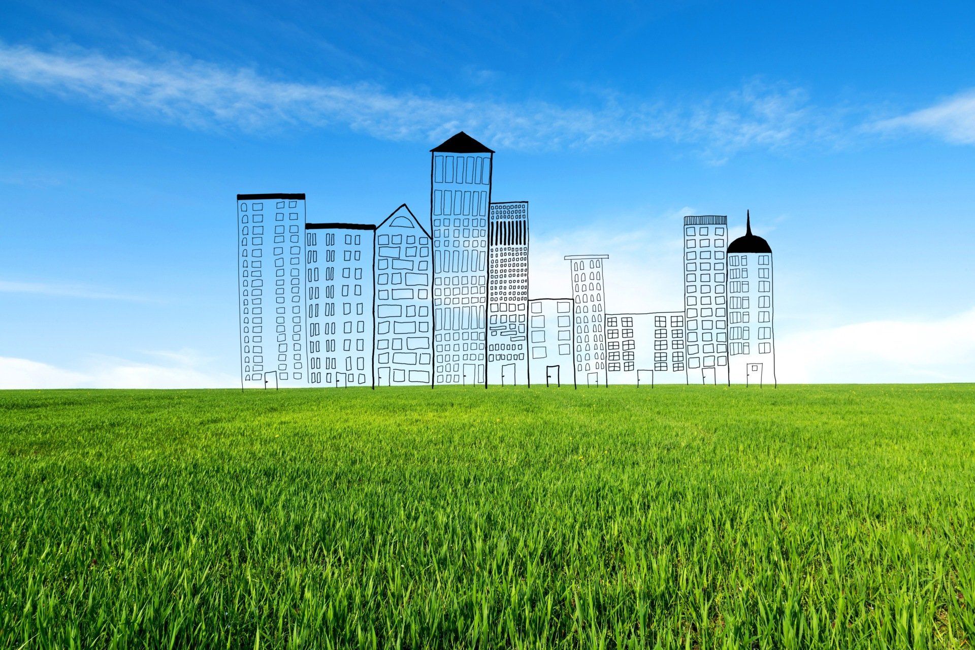 City skyline sketched over a green field, blue sky with clouds in the background.