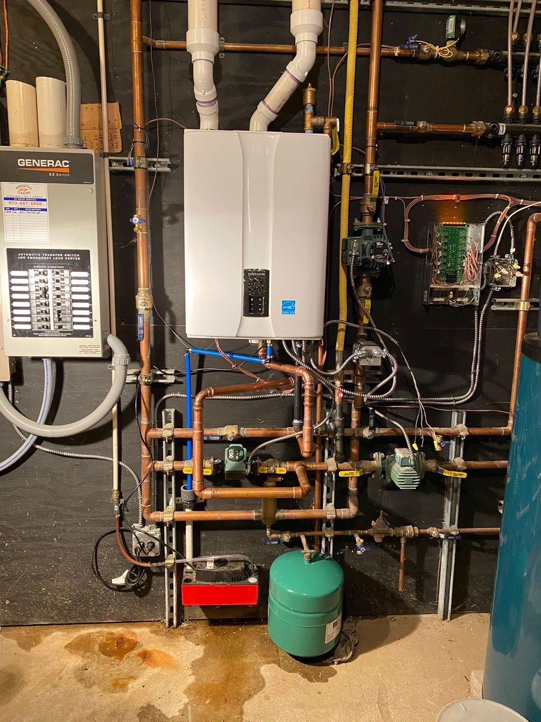 White water heater surrounded with copper pipes - Lafayette, NJ | Clear Water Solutions