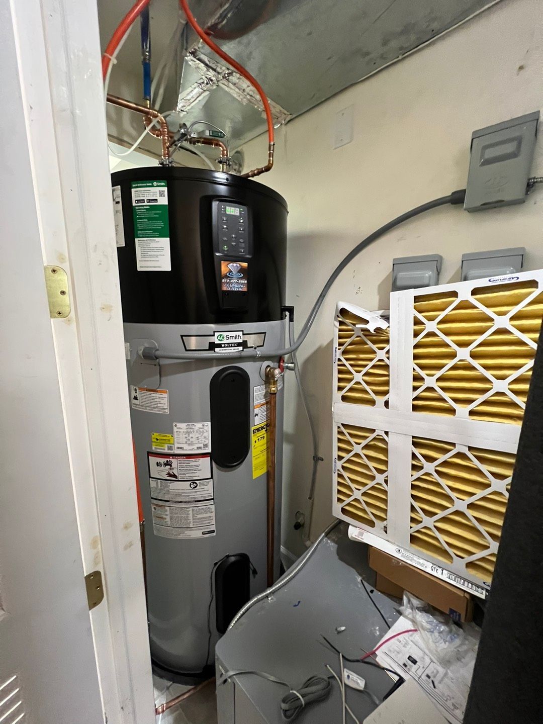 Water heater next to a door - Lafayette, NJ | Clear Water Solutions