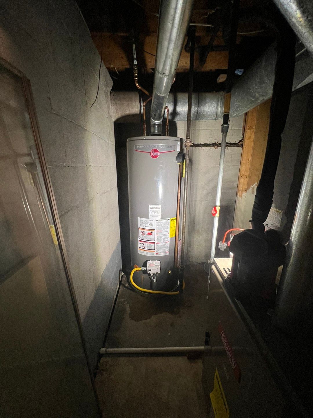 Grey water heater with yellow rubber wire - Lafayette, NJ | Clear Water Solutions