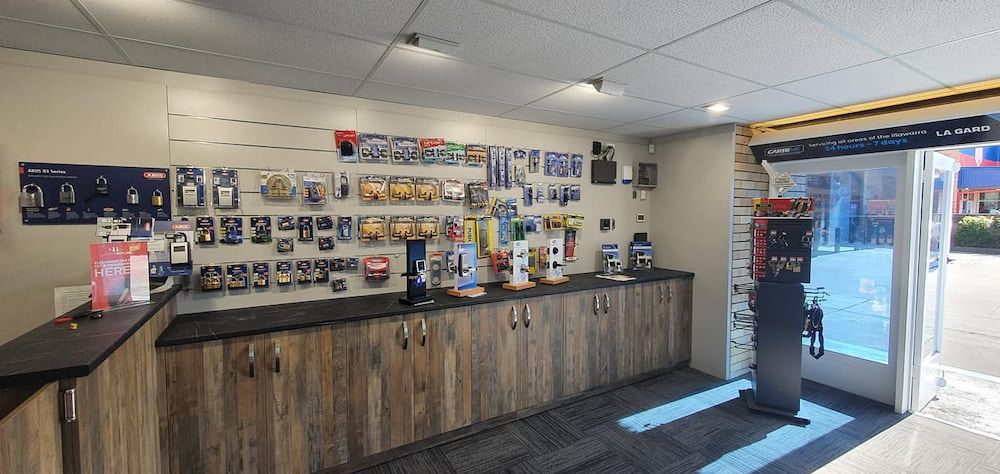 A Room With a Counter and a Lot of Signs on the Wall — South Coast Locksmiths in Shellharbour, NSW