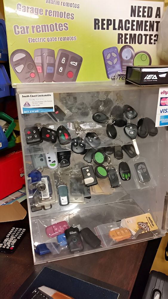 A Display Case Filled With a Variety of Car Remotes — South Coast Locksmiths in Kiama, NSW
