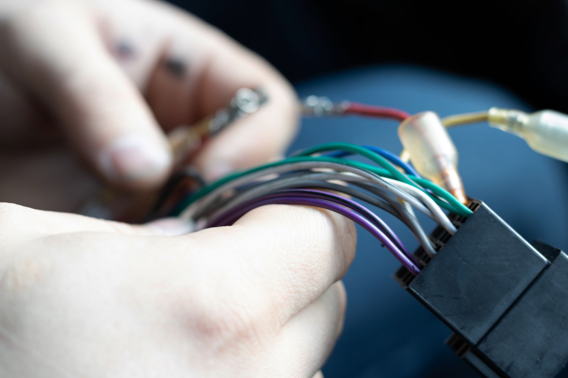 An automotive connector coloured wires in the car.