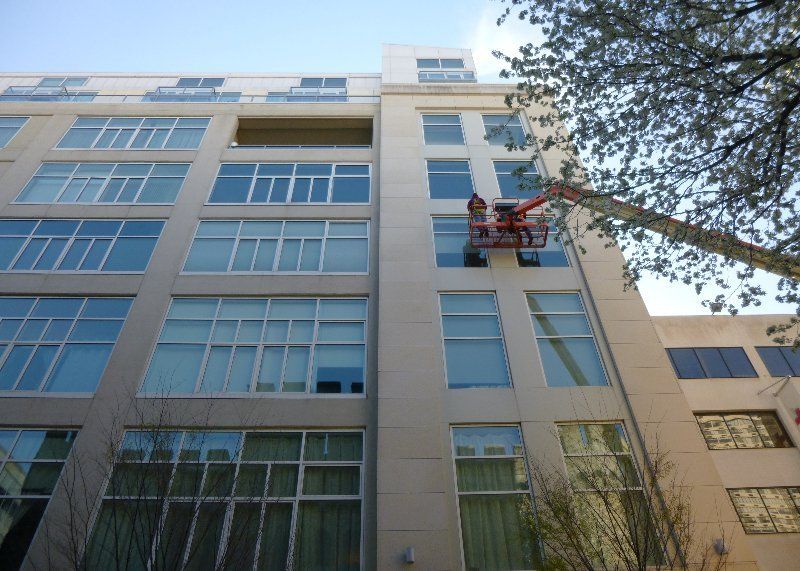 Condo Building with worker