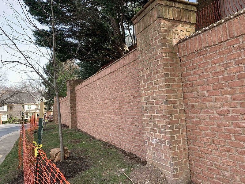 concrete wall with brick veneer