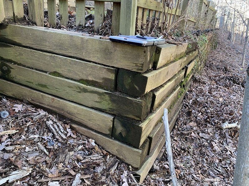 failing timber retaining wall