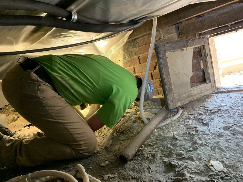 worker inspecting a building