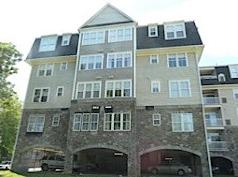 Condominium building with parking
